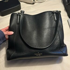 Black Kate spade bag.